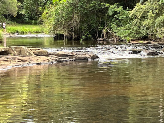 Shallow rock pools before the Waterrfalls